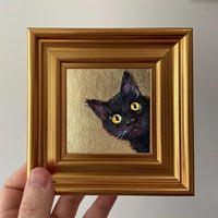 The Staring Black Cat